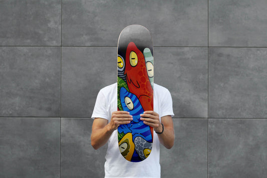 Front view of Christian Zeppieri's Skateboard Deck with coloured lizards